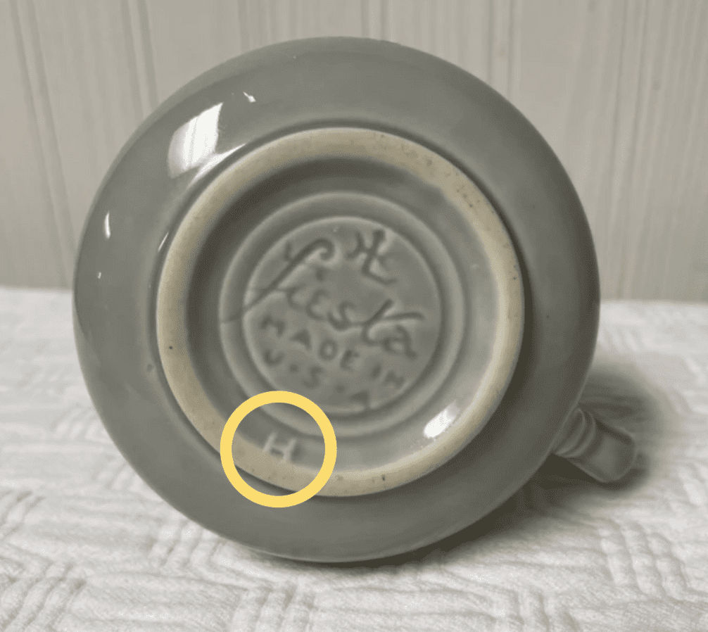 Fiesta cast imprinted mold mark with an "H" below means that the Fiestaware item is newer (NOT a vintage piece)